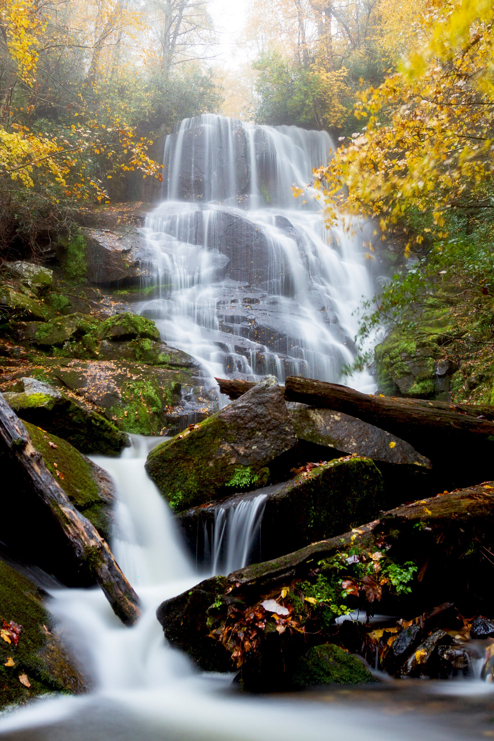Closer view of Eastatoe Falls flowing into a serene Carolina pool